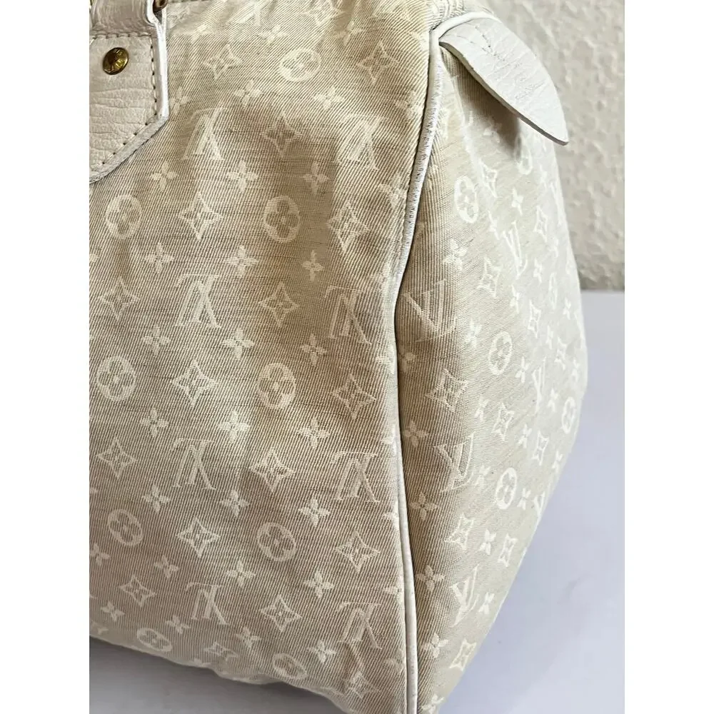 Louis Vuitton off white monogram cloth speedy 30